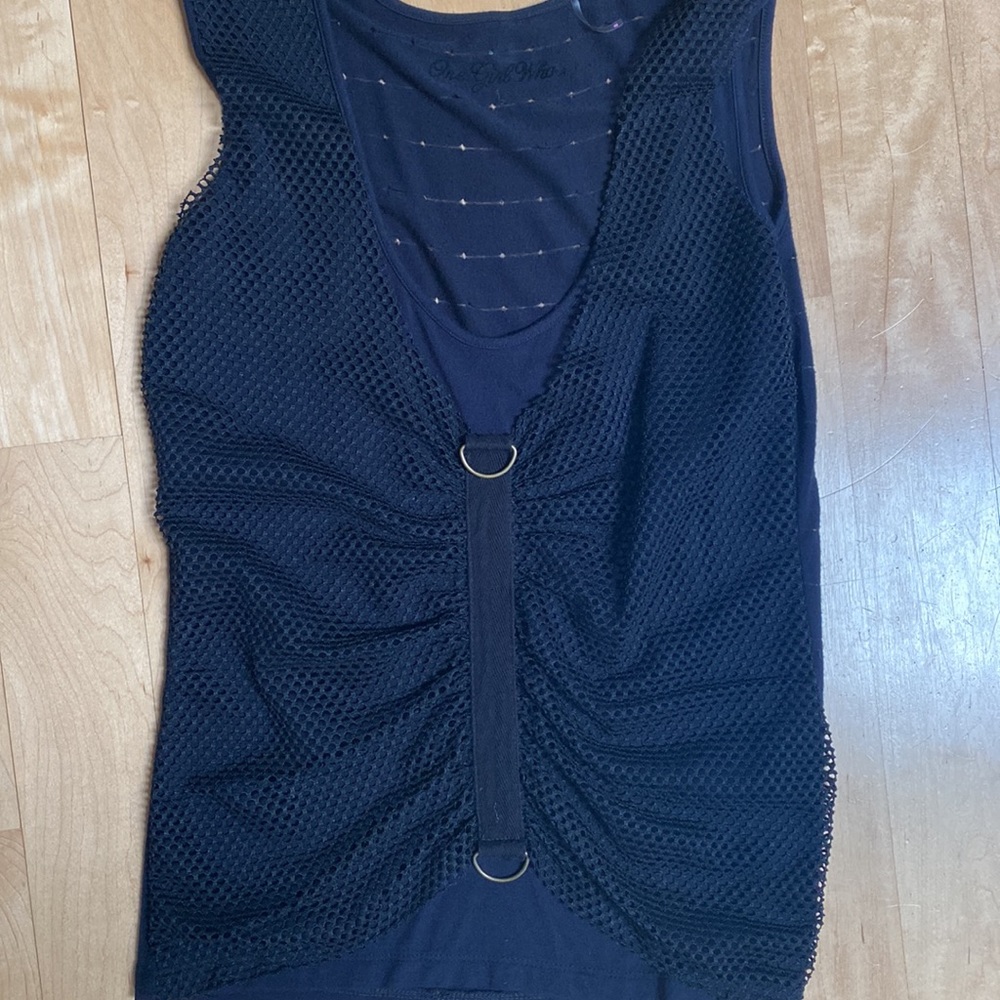 One Girl Who black tank top.